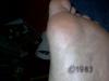 Foot copyright tattoo