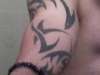 Lower arm tribal tattoo