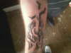 Black and grey cross tattoo