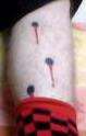 Bullet holes tattoo