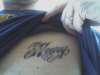 Son's name on chest tattoo