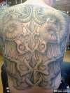 black and grey back piece tattoo