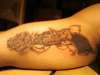 gun and rose tattoo