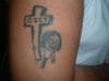 Ozzy Cross tattoo