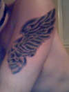 skull with wing tattoo