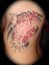 lotus on b&w waves tattoo