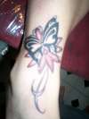 Black/grey flower/butterfly tattoo