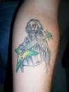Grim reaper on guitar tattoo