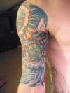 Bicep view of Sublime Halfsleeve tattoo