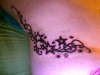 Stars and swirls tattoo