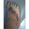 Stars on foot tattoo