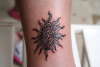 egyptian cross and sun tattoo