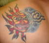 Back shoulder sun/moon tattoo