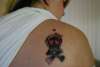 Girl Skull Tat tattoo