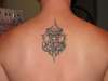 Sacred spike tattoo