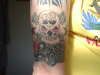 skulls n rods tattoo