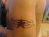 top arm tattoo