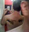 Sistine Back Slap tattoo
