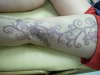 rose vine tattoo