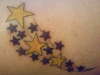 Shooting stars tattoo