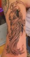 Arm piece tattoo