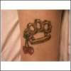 Brass Knuckles tattoo