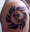 Tribal sun tattoo