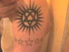 Heartagram with stars tattoo