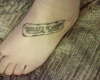 Property of HMS tattoo