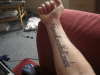Victory Through Harmony tattoo