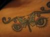 butterfly and eyes tattoo