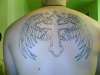 cross and wings tattoo