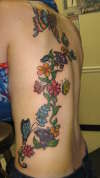 side peace tattoo