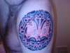 tribal sun tattoo