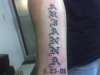 Daughters name and birthdate tattoo