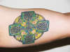 green celtic cross tattoo