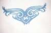 tribal lower back tattoo