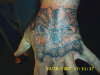 hand skull tattoo