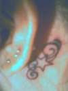 Star behind my ear tattoo
