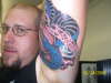 Snake with skull tattoo