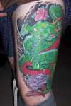 Dragon, left thigh tattoo
