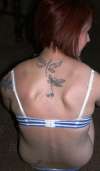 dragonflys down my back tattoo