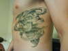 freehanded skull ribcage tattoo