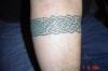 backside of celtic band tattoo