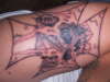 iron cross with demon skull tattoo