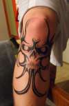 start of knee cap /leg tribal pic 1/2 tattoo