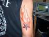 better pic of the star and flames tattoo