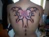 tribal & rose tattoo