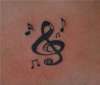 Musical Notes Tramp Stamp tattoo