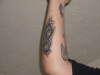 slipknot "s" tattoo